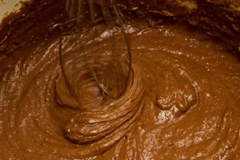 Making of a cream for home-made cakes on a mixer, cooking, whipping eggs an.. Foto stock