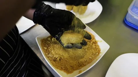 Making croquettes, breading them. Hands with black gloves. Stock Footage 147273340