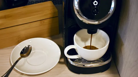 Making a cup of espresso coffee with a capsule coffee machine ProRes 4K Stock Footage 164206550