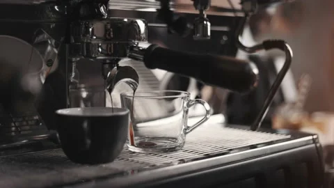 Making a cup of strong coffee in a coffee machine Stock Footage 188906824
