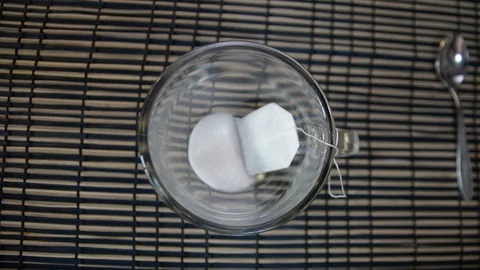 Making a cup of tea with a tea bag 스톡 동영상 95438449