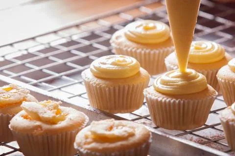 Making cupcakes Stock Photos
