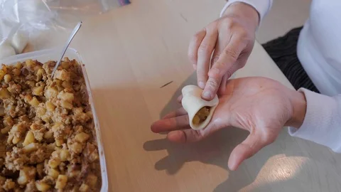Making Curry Puff or Karipap Stock Footage 109040970