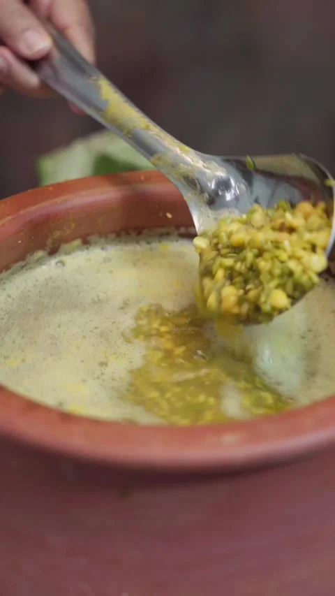 Making dal or daal in a Mitti Degchi Set or Mitti Containers. Stock Footage 283362235