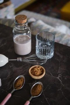 Making Dalgona Coffee at home, Preparing Homemade Dalgona Coffee Stock Photos