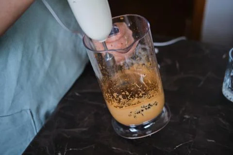 Making Dalgona Coffee at home, Preparing Homemade Dalgona Coffee Stock Photos