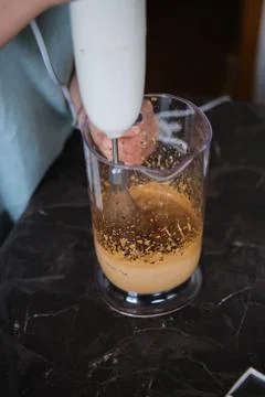 Making Dalgona Coffee at home, Preparing Homemade Dalgona Coffee Stock Photos
