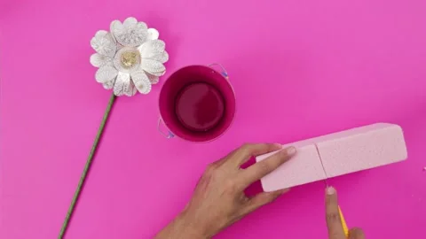 Making a decorative paper flower in its pot Stock Footage 168727239