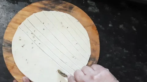 Making Decorative Shankarpale Patterns on Dough Before Frying Video stock 335078983