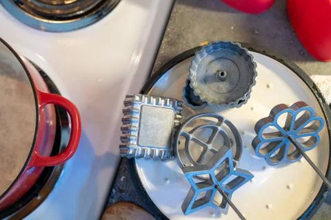 Making deep fried rosette cookies Stock Photos