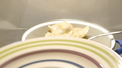 Making delicious dumplings from the dough Stock-Footage 122096664