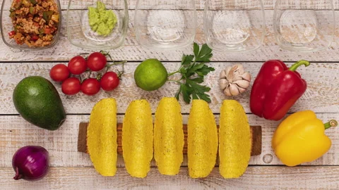 Making delicious hard shell tacos - top view, stop motion animation Video stock 131699246
