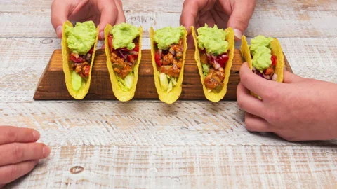 Making delicious hard shell tacos from ingredients - stop motion animation 스톡 동영상 131700411