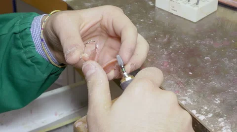 Making of a dental bridge in a laboratory specialized in dental technology Stock Footage 59940123