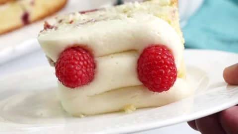 Making a dessert called Red Raspberry Tea Cake made with fresh berries and Stock Footage 313180298