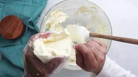 Making a dessert called Red Raspberry Tea Cake made with fresh berries and Stock Footage 313180312