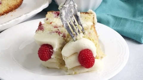 Making a dessert called Red Raspberry Tea Cake made with fresh berries and Stock Footage 313180317