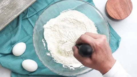 Making a dessert called Red Raspberry Tea Cake made with fresh berries and Stock Footage 313180339