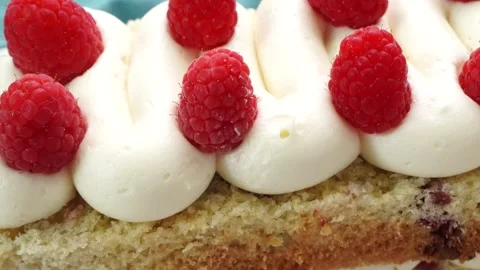 Making a dessert called Red Raspberry Tea Cake made with fresh berries and Stock Footage 313180361