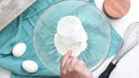 Making a dessert called Red Raspberry Tea Cake made with fresh berries and Stock Footage 313256768
