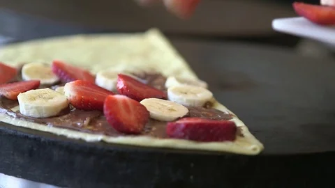 Making dessert crepe Stock Footage 70640262