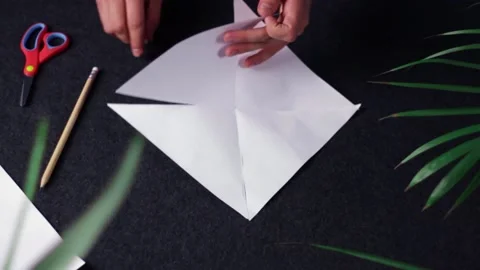 Making a diy windmill craft on desk top down shot Video stock 132729916