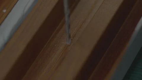 Making door chaukhat and  Drilling Brown Mild Steel Door Frame In factory Stock Footage 286956016