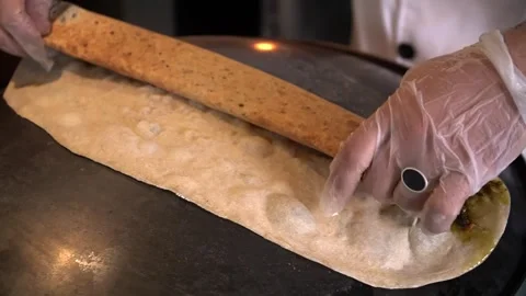 Making Dosa on Griddle Stock Footage 319951045