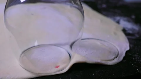 Making dough circles for dumplings Stock Footage 190513122