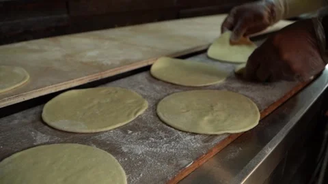 Making Dough for Flatbread Stock Footage 318310037