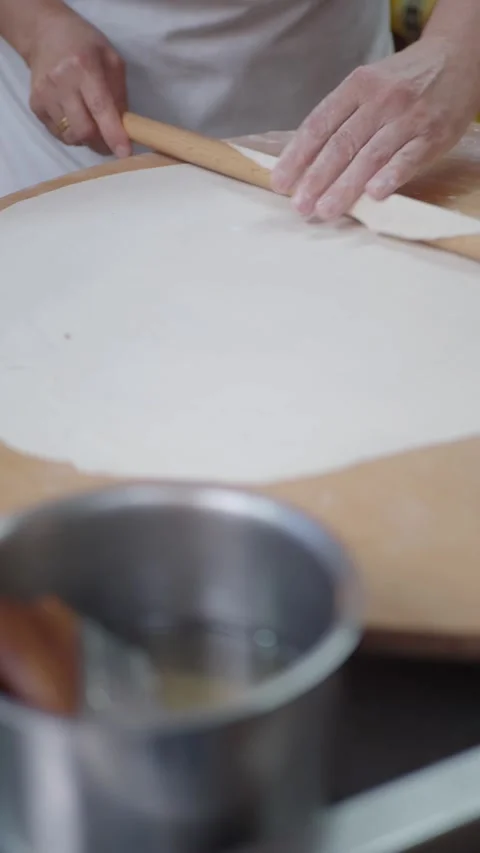 Making dough in a kitchen Stock Footage 341373176
