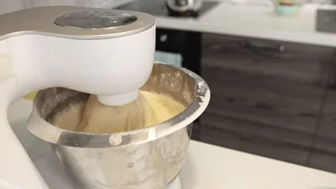Making dough in kneader machine for homemade doughnuts  Stock Footage 147515876