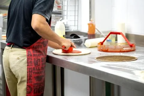 Making dough by men hands Stock Photos