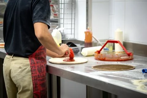 Making dough by men hands Stock Photos