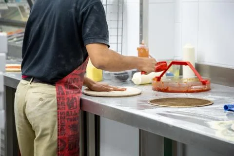 Making dough by men hands Stock Photos