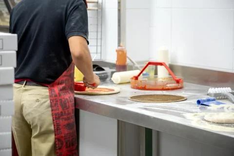 Making dough by men hands Stock Photos