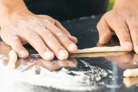 Making dough on a silver board Stock Photos