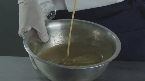 Making a dough with the wire whip Stock Footage 92111003