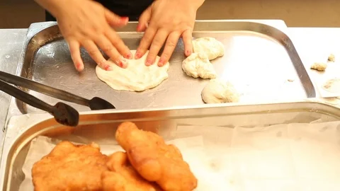 Making doughnuts dough close - up female hands in the kitchen Stock Footage 94541577