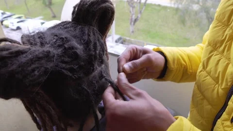 Making Dreadlocks Stock Footage 171622673