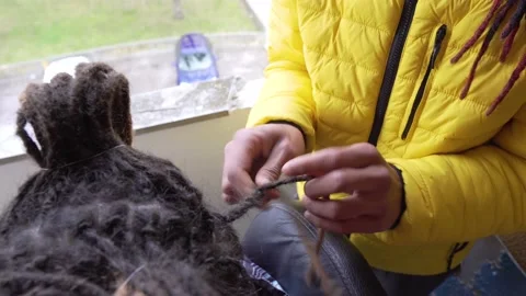 Making Dreadlocks Stock Footage 171622709