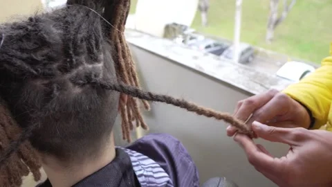 Making Dreadlocks Stock Footage 171622718