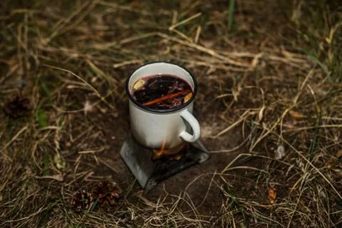 Making a drink outdoors in an Esbit oven Stock Photos