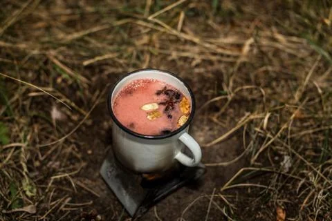 Making a drink outdoors in an Esbit oven Stock Photos