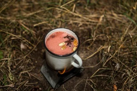 Making a drink outdoors in an Esbit oven Stock Photos