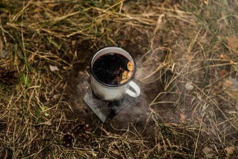 Making a drink outdoors in an Esbit oven Stock Photos