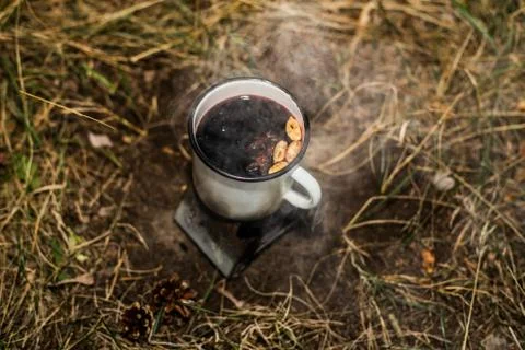 Making a drink outdoors in an Esbit oven Stock Photos