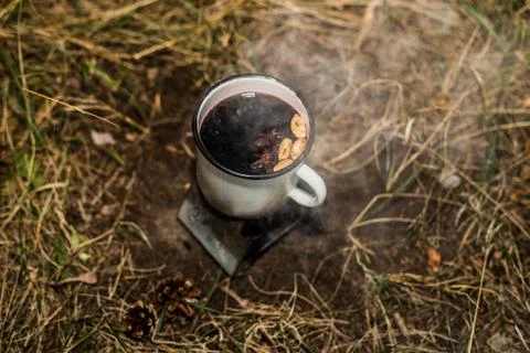 Making a drink outdoors in an Esbit oven Stock Photos
