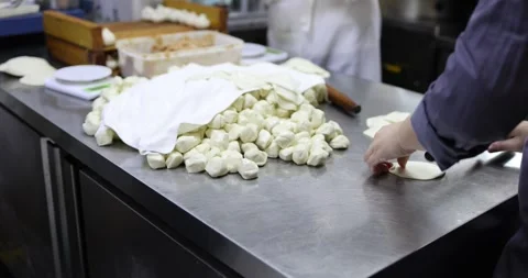 Making Dumplings Chinese Kitchen Workers Flattening Dough Rollong Dough Stock Footage 263038840