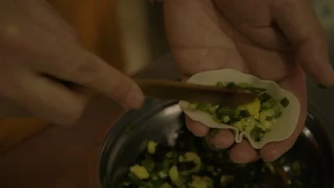 Making Dumplings by Hand with Vegetable Filling in Beijing Street Food Scene Stock Footage 345881712
